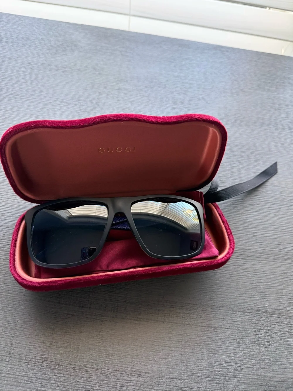 Gucci Black Frame Sunglasses with blue sides and Dark Lenses and Maroon Case